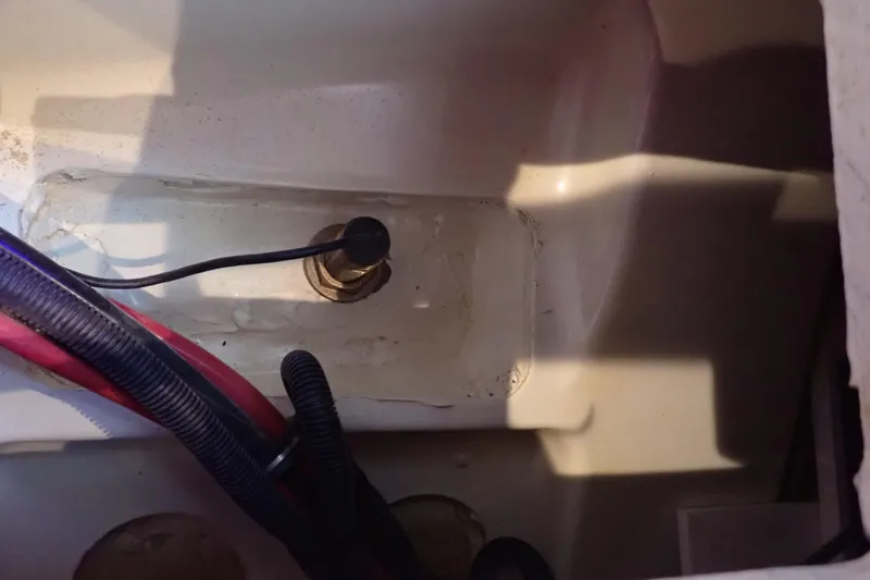 Slide: The Image of Interior view of a 2022 Formula 400 Super Sport Crossover boat's wiring and components. - 20