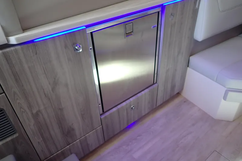 Slide: The Image of Interior of 2022 Formula 400 Super Sport Crossover with sleek cabinetry and ambient lighting. - 27
