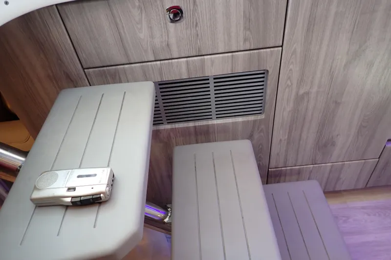 Slide: The Image of Interior of 2022 Formula 400 Super Sport Crossover with wooden cabinetry and seating. - 28