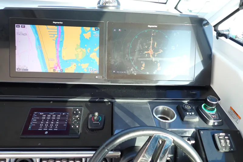 Slide: The Image of Dashboard of 2022 Formula 400 Super Sport Crossover with navigation and control systems. - 3