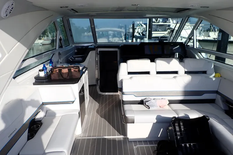 Slide: The Image of Interior of 2022 Formula 400 Super Sport Crossover yacht with luxurious seating and modern design. - 4