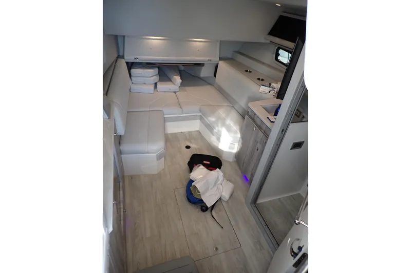 Slide: The Image of Interior of 2022 Formula 400 Super Sport Crossover boat, featuring modern seating and amenities. - 5
