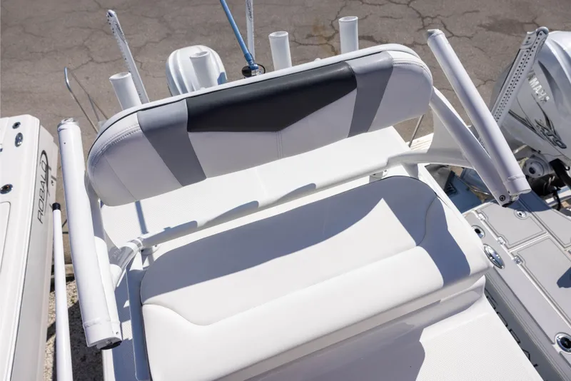 Slide: The Image of 2022 Robalo 246 Cayman SD boat seating and rod holders, showcasing sleek design and functionality. - 12