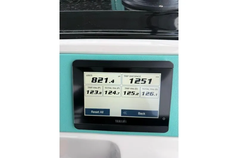 Slide: The Image of Yamaha display showing trip data on 2024 Ranieri Cayman 27.0 Sport boat. - 22