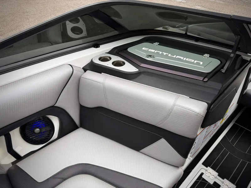 Slide: The Image of Interior of 2023 Centurion Ri230 with sleek seating and speaker. - 12