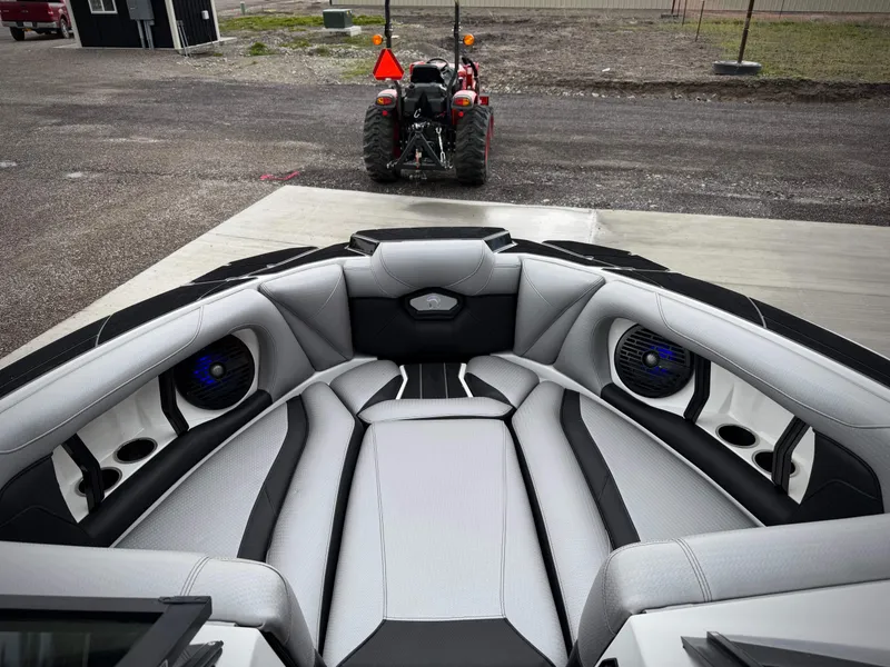 Slide: The Image of Interior of a 2023 Centurion Ri230 boat with luxurious seating. - 13