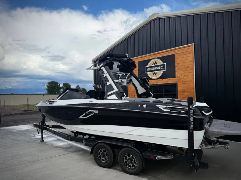 Slide: The Image of 2023 Centurion Ri230 boat in front of Montana Wake Co. building. - 4
