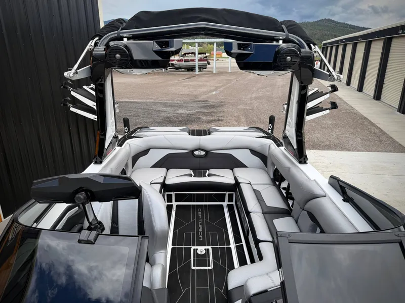 Slide: The Image of Interior of 2023 Centurion Ri230 boat with luxurious seating. - 9