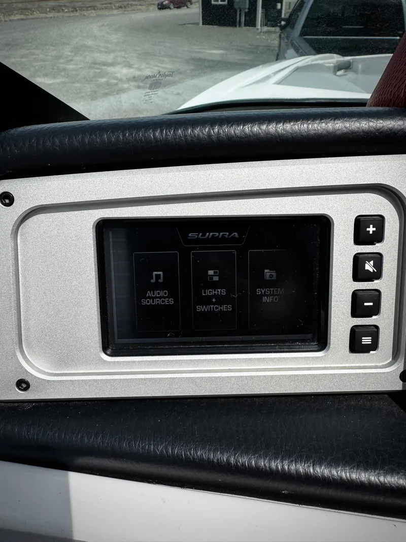 Slide: The Image of 2020 Supra SE 550 control panel with audio and lighting options. - 12