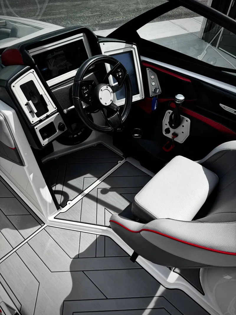 Slide: The Image of Interior of 2020 Supra SE 550 with modern helm station. - 13