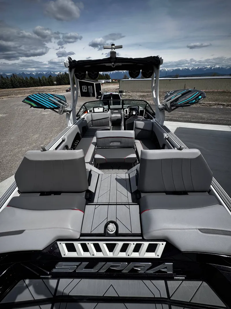 Slide: The Image of Interior view of 2020 Supra SE 550 boat with gray seating. - 6