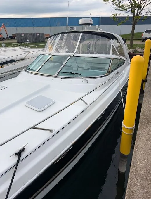 Slide: The Image of 2005 Formula 370 Super Sport boat docked at harbor. - 17