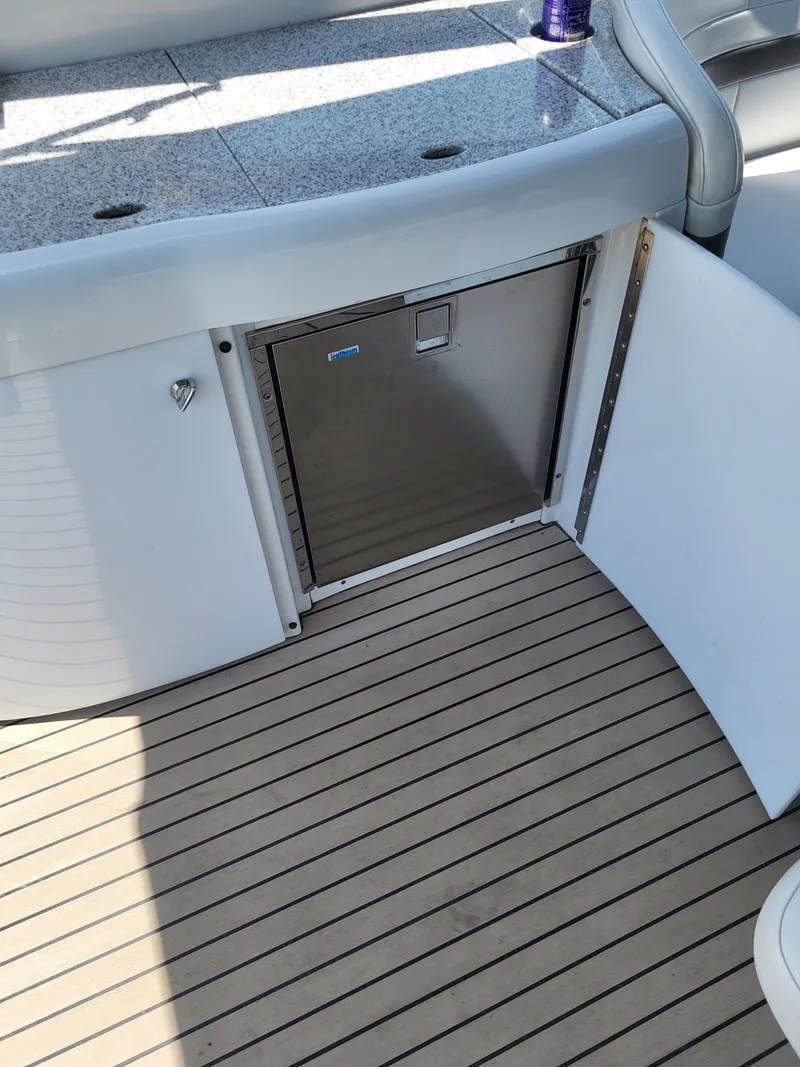 Slide: The Image of Interior of a 2005 Formula 370 Super Sport yacht with refrigerator. - 21