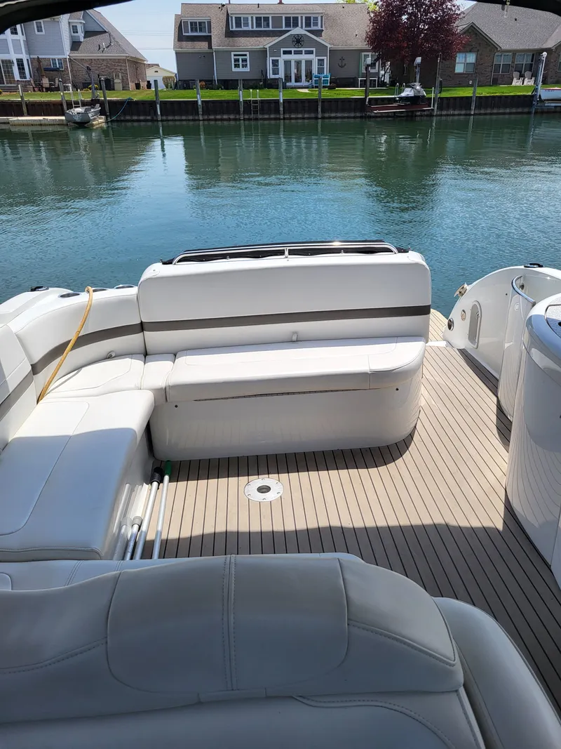 Slide: The Image of Interior of a 2005 Formula 370 Super Sport yacht by the water. - 22