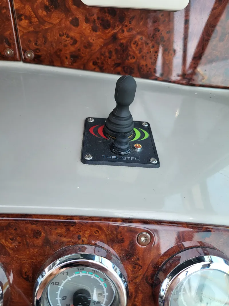 Slide: The Image of Joystick control in the cockpit of a 2005 Formula 370 Super Sport. - 26