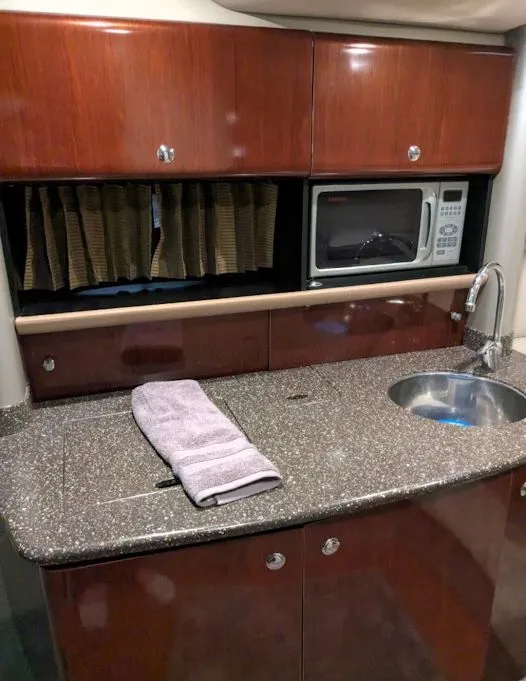 Slide: The Image of 2005 Formula 370 Super Sport yacht kitchen interior. - 36