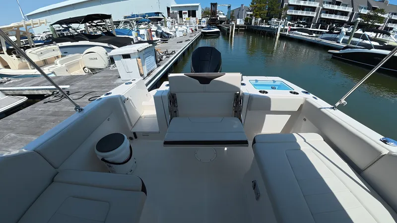 Slide: The Image of Interior of 2024 Sailfish 226 DC boat at the marina. - 13
