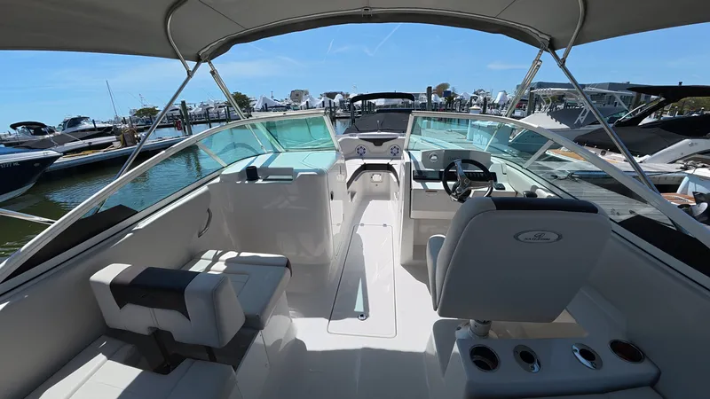 Slide: The Image of Interior view of 2024 Sailfish 226 DC boat at the marina. - 14