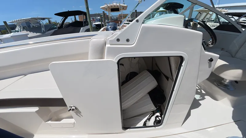 Slide: The Image of Storage compartment in 2024 Sailfish 226 DC boat. - 28