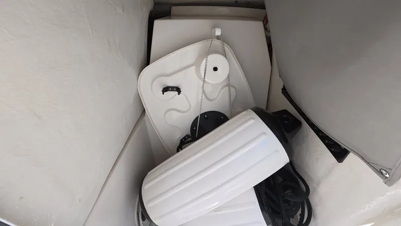 Slide: The Image of Sailfish 226 DC 2024 boat accessories in storage compartment. - 29