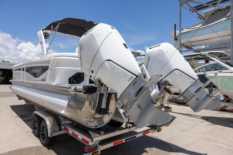 Slide: The Image of 2026 Premier 270 Intrigue RF - CL boat with dual Mercury outboard engines on trailer. - 4