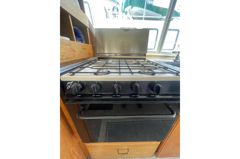 Slide: The Image of 1974 Tollycraft 37 Sedan kitchen with a Magic Chef stove and oven. - 18