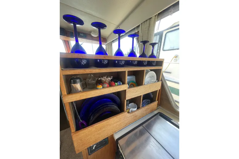 Slide: The Image of Interior of 1974 Tollycraft 37 Sedan with blue glasses. - 23