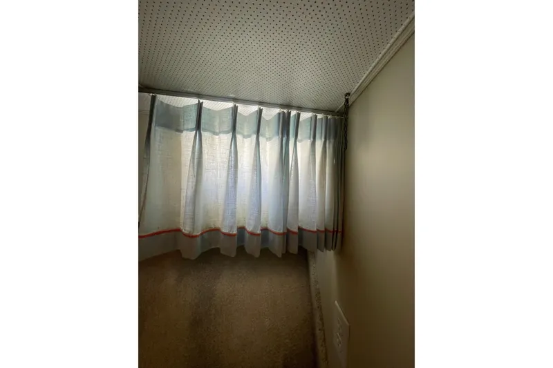 Slide: The Image of Curtained window inside a 1974 Tollycraft 37 Sedan boat cabin. - 36