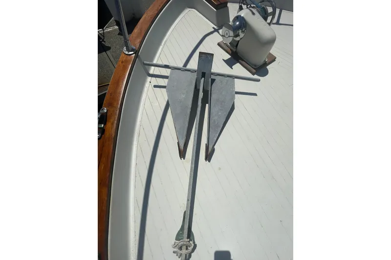 Slide: The Image of 1974 Tollycraft 37 Sedan boat deck with anchor and winch. - 4