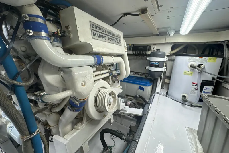 Slide: The Image of Engine room of a 1997 Bertram 54 Convertible with Detroit Diesel Marine Power. - 31