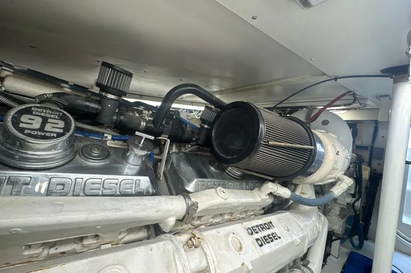 Slide: The Image of Engine room of a 1997 Bertram 54 Convertible with Detroit Diesel 92 series engine. - 42