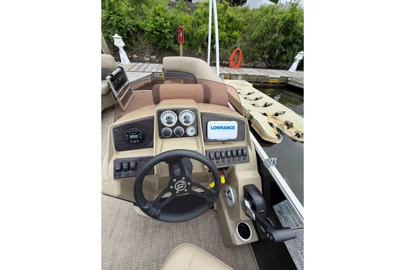 Slide: The Image of 2022 Sylvan Mirage 8522 Resorter boat dashboard with Lowrance navigation system. - 11