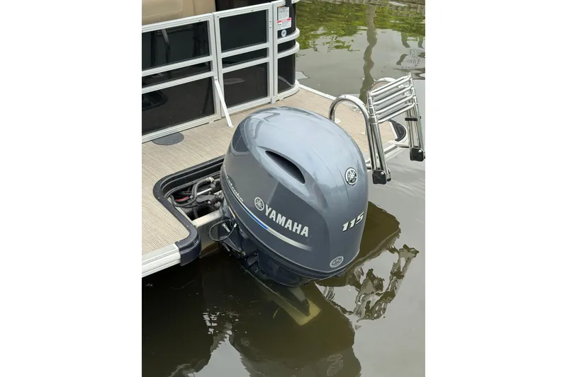 Slide: The Image of 2022 Sylvan Mirage 8522 Resorter with Yamaha 115 outboard motor on water. - 14