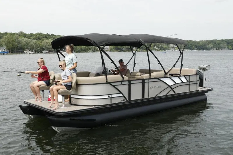 Slide: The Image of Manufacturer Provided Image: 2022 Sylvan Mirage 8522 Resorter pontoon boat on a lake with people fishing. - 5
