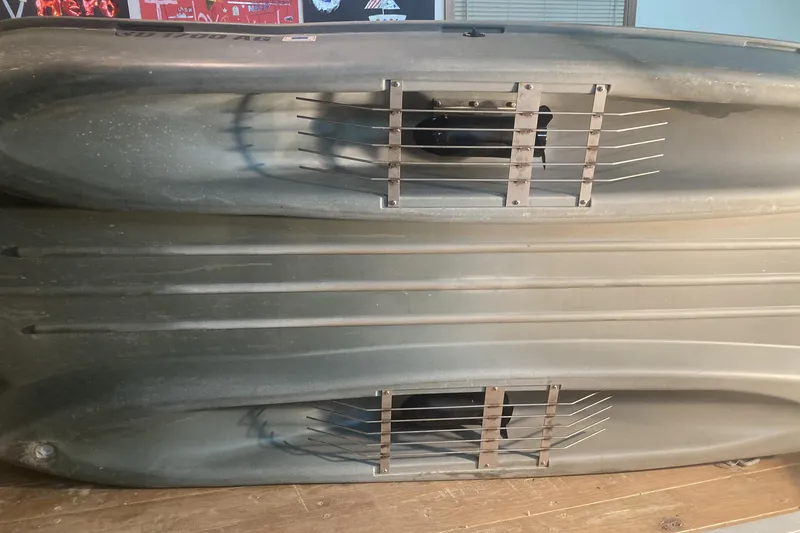 Slide: The Image of 2023 Freedom Twin Troller X10 kayak underside with dual propeller system. - 3