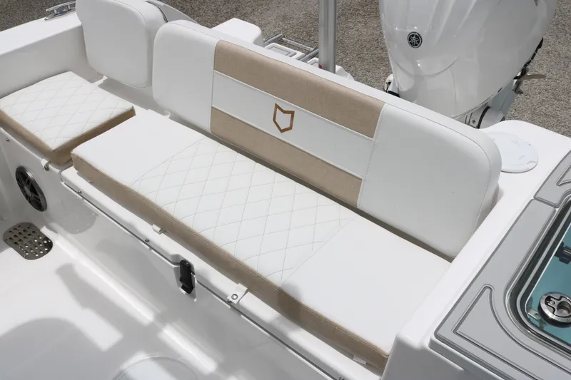 Slide: The Image of 2026 Sea Fox 228 Commander boat seating with beige and white upholstery. - 10