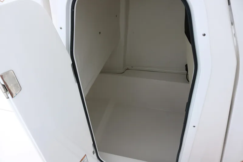 Slide: The Image of Open storage compartment on 2026 Sea Fox 228 Commander boat. - 8