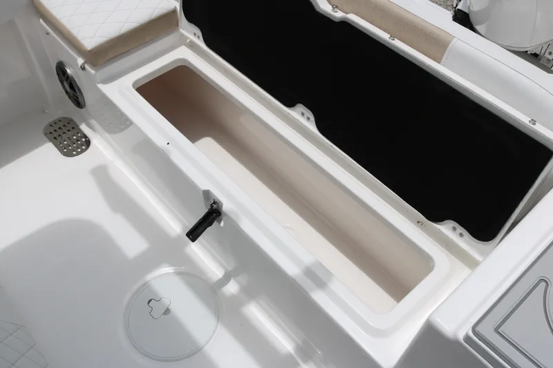 Slide: The Image of Storage compartment on 2026 Sea Fox 228 Commander boat, featuring sleek white interior design. - 9