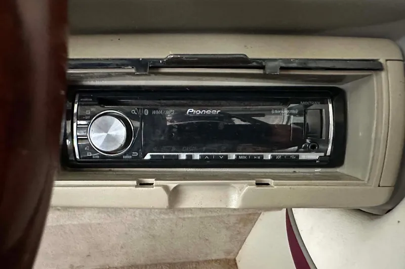 Slide: The Image of Pioneer stereo system in a 1998 Crownline 248 BR boat dashboard. - 7