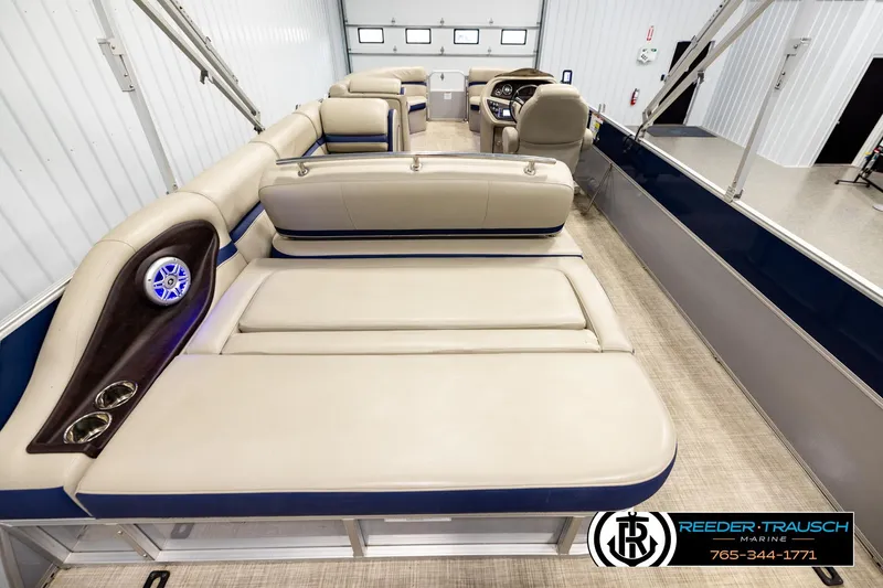 Slide: The Image of 2019 Berkshire 24 SB2 CTS pontoon boat interior with beige seating and modern design. - 16