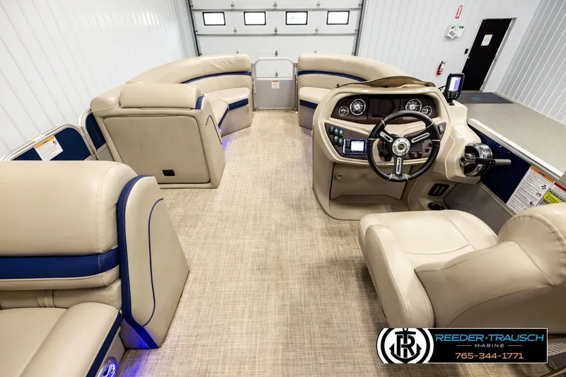 Slide: The Image of Interior of a 2019 Berkshire 24 SB2 CTS pontoon boat with beige seating and modern helm. - 17