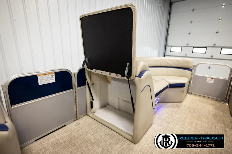 Slide: The Image of 2019 Berkshire 24 SB2 CTS pontoon interior with storage compartment and seating. - 24