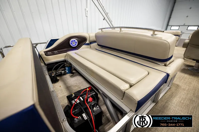 Slide: The Image of 2019 Berkshire 24 SB2 CTS pontoon boat interior with beige seating and audio system. - 33
