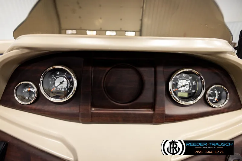 Slide: The Image of Dashboard of a 2019 Berkshire 24 SB2 CTS boat with gauges and controls. - 39