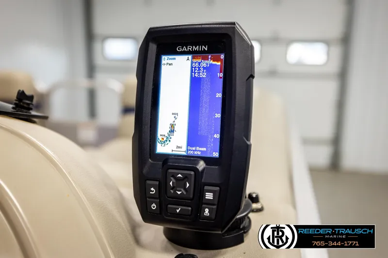 Slide: The Image of Garmin fishfinder on 2019 Berkshire 24 SB2 CTS boat, displayed in a marine showroom. - 40