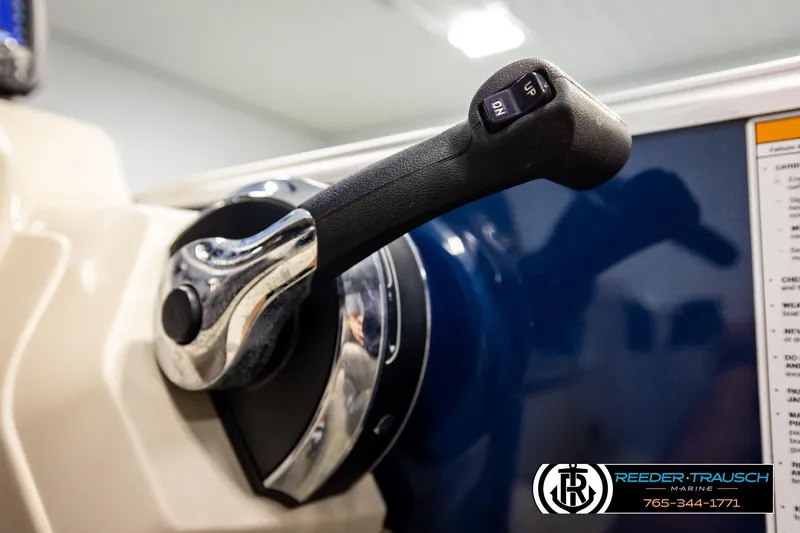 Slide: The Image of Close-up of 2019 Berkshire 24 SB2 CTS throttle control in a boat cockpit. - 42