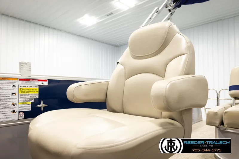 Slide: The Image of Beige captain's chair on 2019 Berkshire 24 SB2 CTS boat in a showroom. - 44