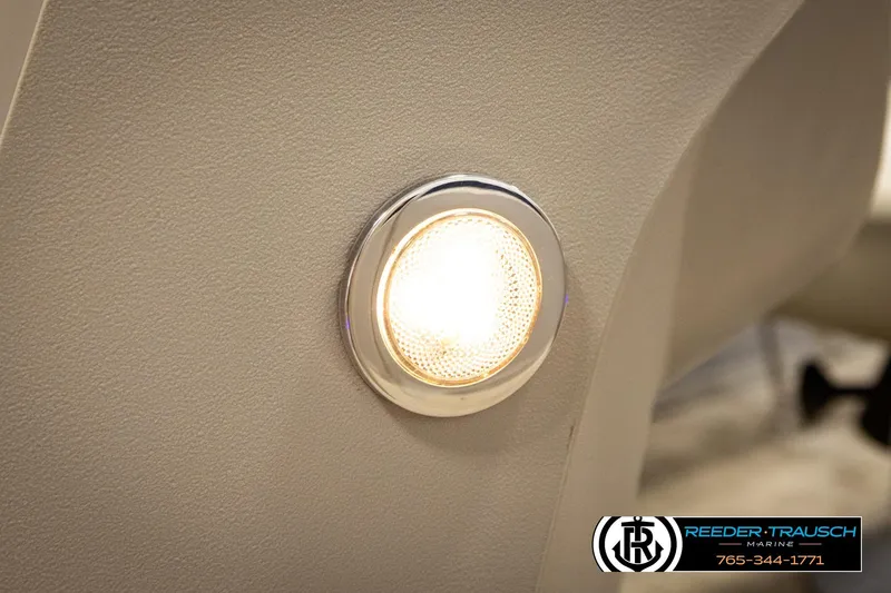 Slide: The Image of LED light on 2019 Berkshire 24 SB2 CTS boat interior, Reeder-Trausch Marine logo visible. - 47