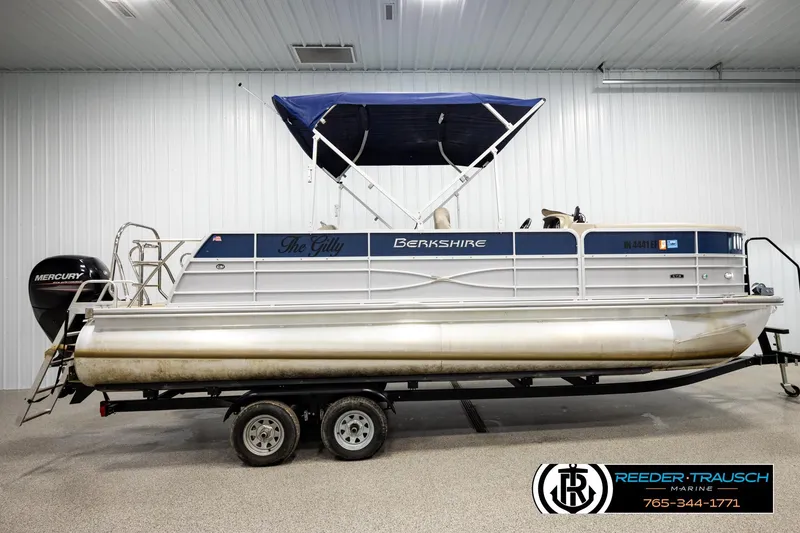 Slide: The Image of 2019 Berkshire 24 SB2 CTS pontoon boat with Mercury engine in indoor showroom. - 5