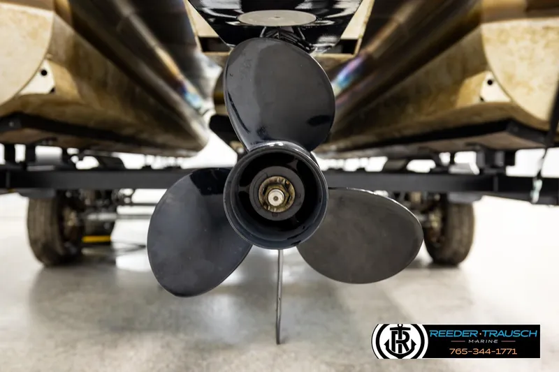 Slide: The Image of Close-up of a 2019 Berkshire 24 SB2 CTS boat propeller in a showroom. - 52